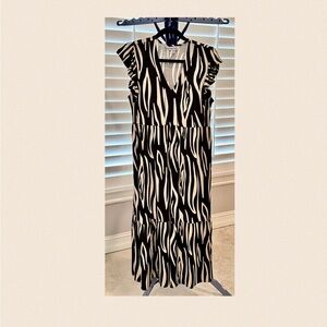 Stylish Black and White Zebra Print Dress with ruffle sleeve.